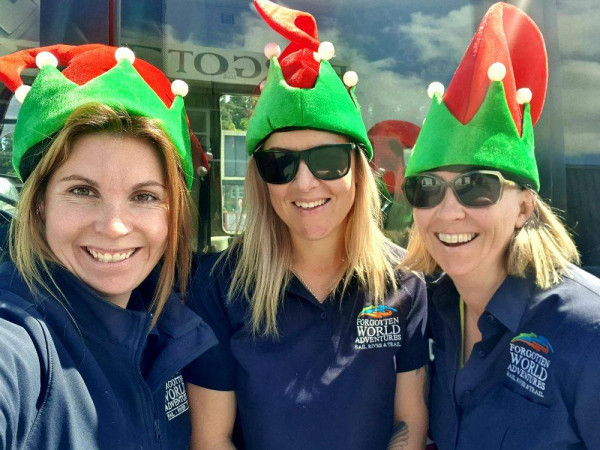 Forgotten World Adventures staff is celebrating the holidays with elf hats on