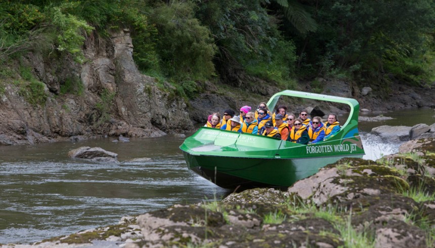Forgotten World Jet Boat skimming past the banks of the Whanganui River